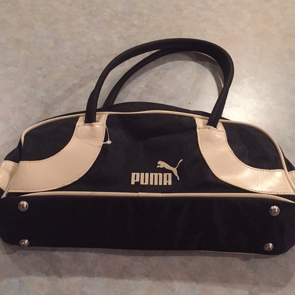 Puma black and cream colored fabric purse. - Picture 1 of 9